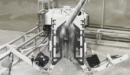 The walking wheels and tracks rotate,moving at a constant speed to remove ice.